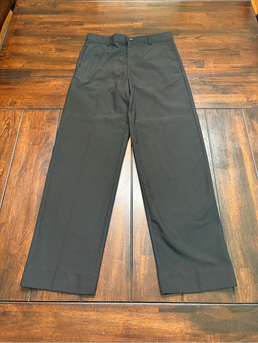 Boy’s black straight leg adjustable pants in a size 14